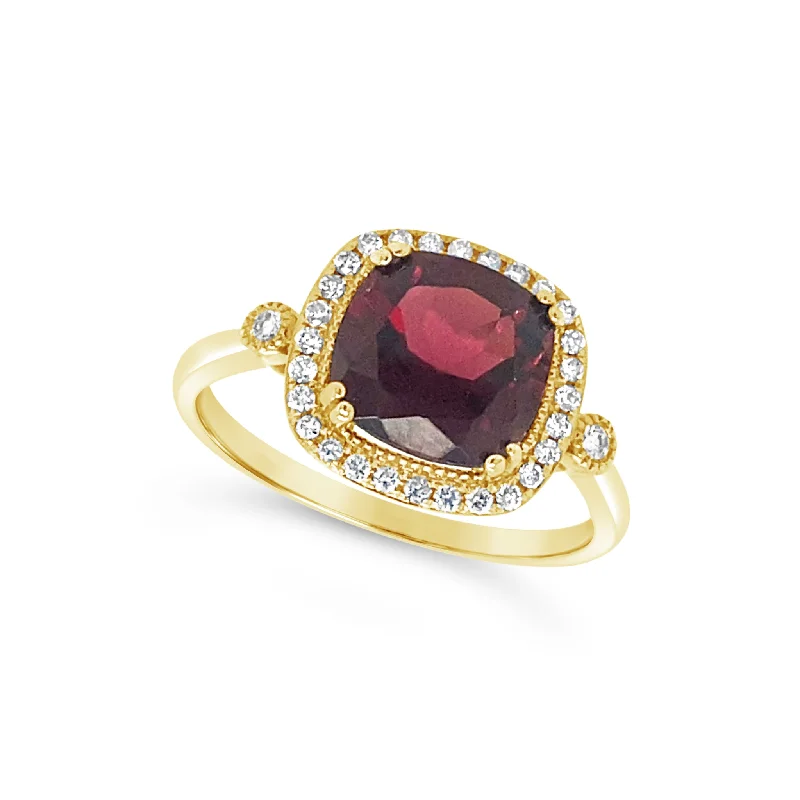 Must-Have Jewelry Pieces At Reduced Prices Cushion Garnet and Diamond Halo Ring