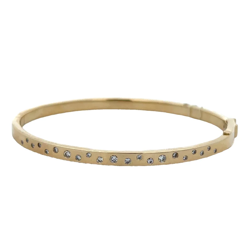 Luxury Jewelry Now At Special Promotional Rates Flush Set Diamond Bangle Bracelet in Yellow Gold
